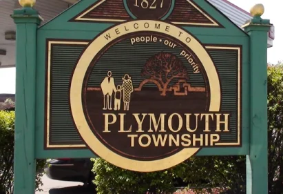 Sign welcoming people to Plymouth Township in Michigan
